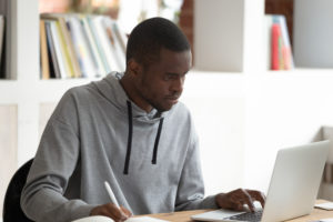 black man doing internet research