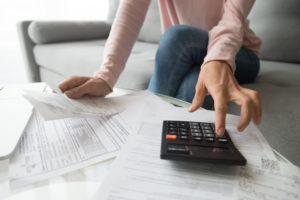 woman calculating her bills