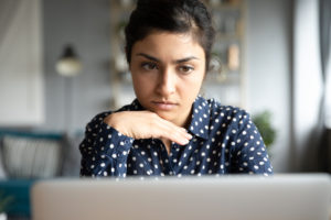 woman doing computer researchs