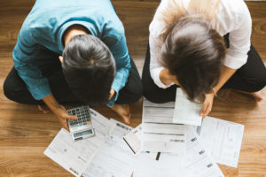 couple poring over their bills