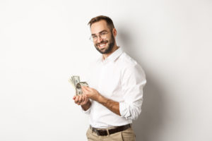 happy man holding money