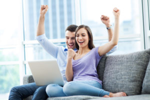 couple-celebrating-loan-approval