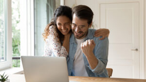 couple happy to see their loan was approved