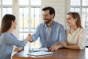 man with associate agreeing to legal funding