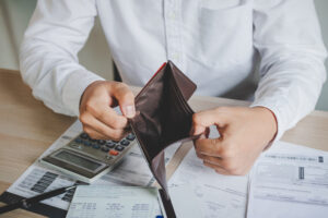 broke businessman with empty wallet