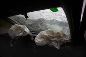 two deflated airbags in car