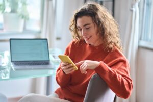 woman happily getting loan approval