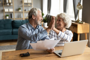 couple happy to be able to pay bills