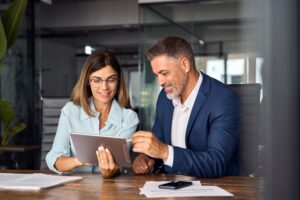 happy couple reviewing finances