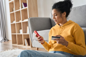 woman checking to see if her legal funding application was approved